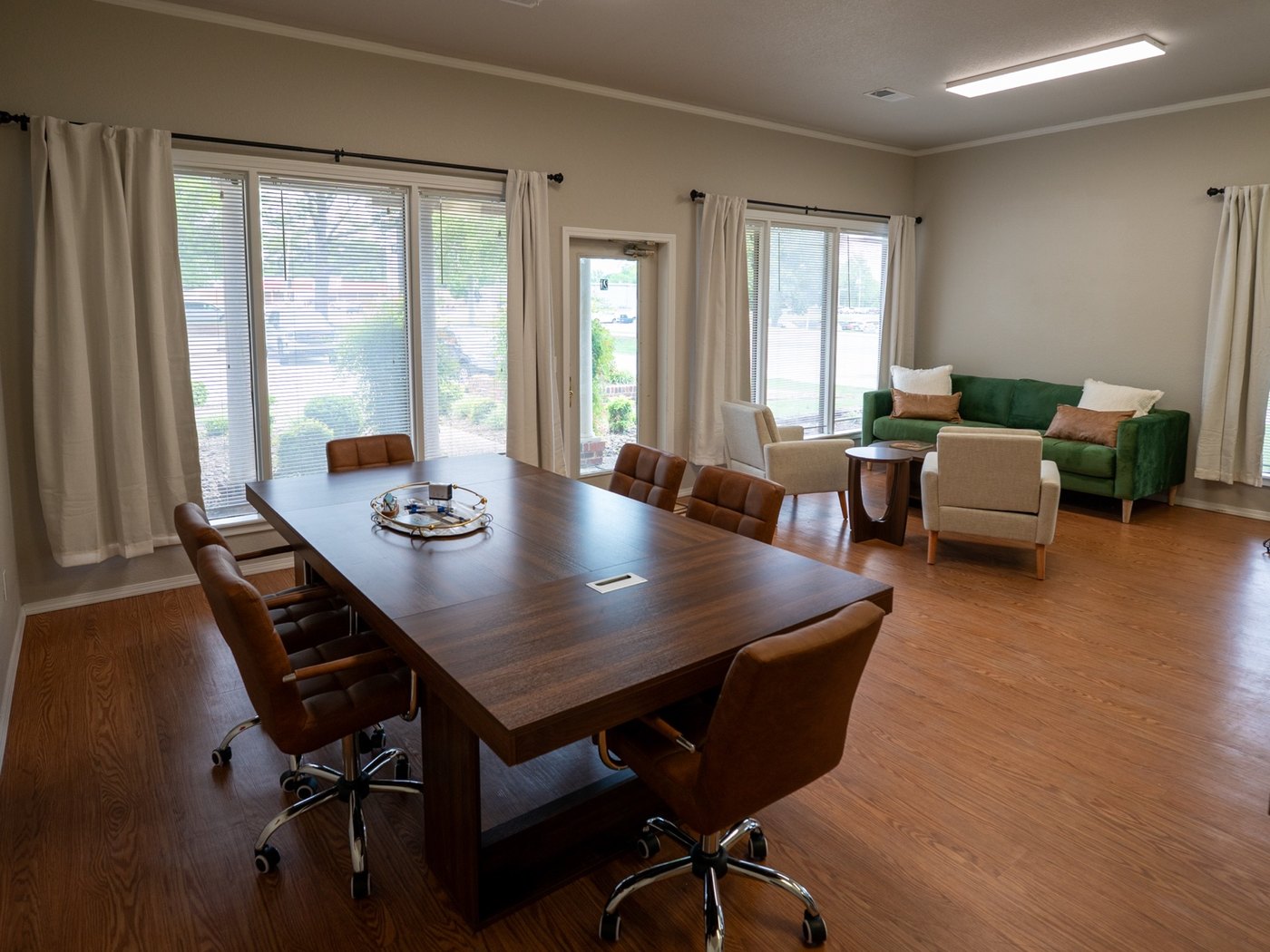 The conference table and sitting area inside the 1031 QualEx office